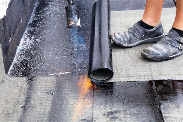 Professional flat roof waterproofing with bitumen welding membranes