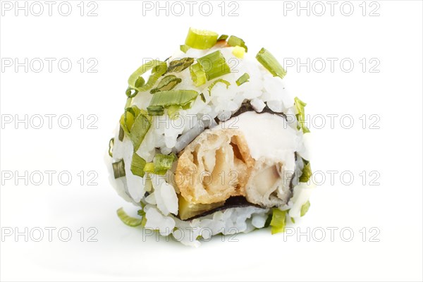 Japanese maki sushi rolls with green onion, isolated on white background. Side view, close up, selective focus