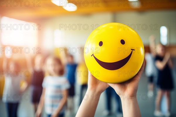 Child holding yellow ball with happy smiling face. Concept for happiness in schools or daycares. KI generiert, generiert AI generated