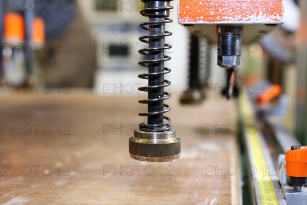 Automatic drilling machine or hole line drilling machine as used in a cabinet maker's workshop