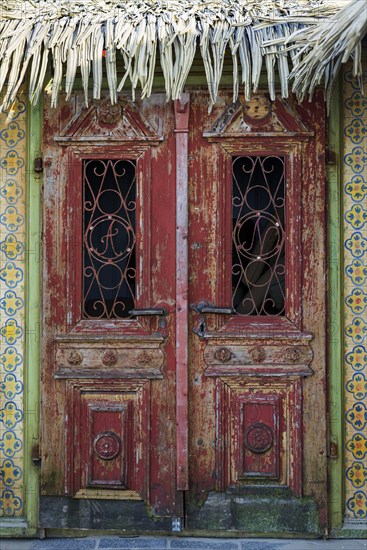 Caribbean wooden house facade, wooden house, pastel, pastel, facade, building, architecture, entrance, door, terrace, dilapidated, faded, withered, old, empty, abandoned, colourful
