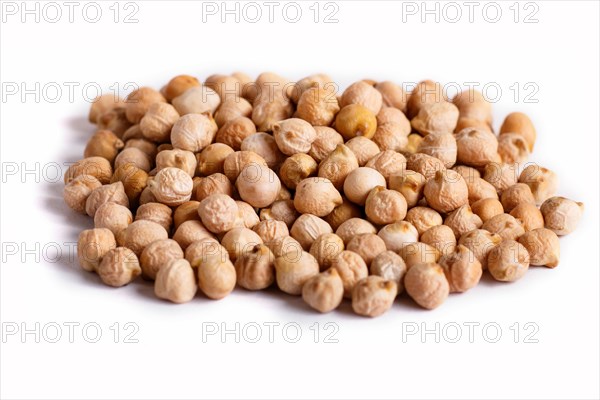 Pile of chickpeas isolated on white background. Closeup