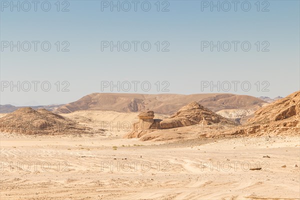 Desert, red mountains, rocks and blue sky. Egypt, the Sinai Peninsula, Dahab