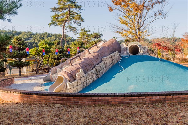 Playground slides in wilderness park in Pohang, South Korea, Asia