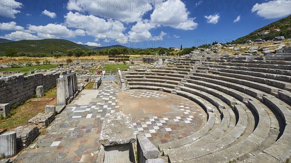 The ancient theatre with its ruins and steps under a cloudy sky, sanctuary of Asclepius, Ecclesiasterion, meeting place of the citizens, archaeological site, Ancient Messene, capital of Messinia, Messini, Peloponnese, Greece, Europe