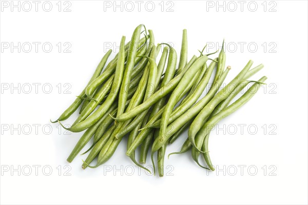 Bunch of green french beans isolated on white background. side view, close up