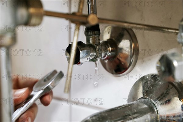 Close-up of sanitary work on a washbasin