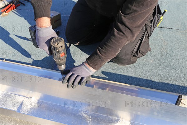 Tinsmith work on a flat roof