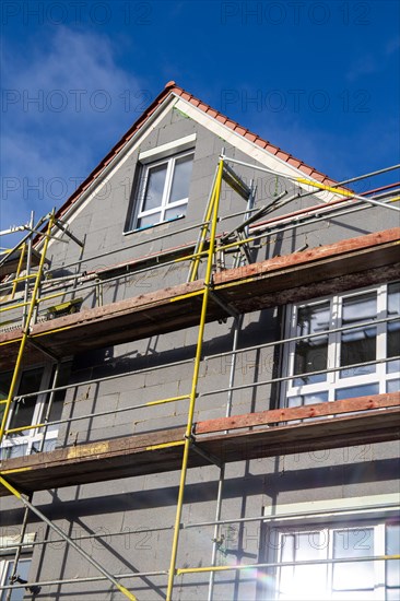 Thermal insulation of a house facade on a new building