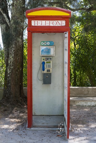 Historic telephone box, communication, telephone, landline, telecommunication, mobile, conversation, telephone machine, speak, communicate, connection, history, historical, red, English, Portugal, Europe