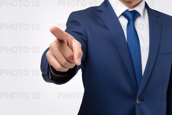 Man in business suit pointing finger at camera on white background. KI generiert, generiert AI generated