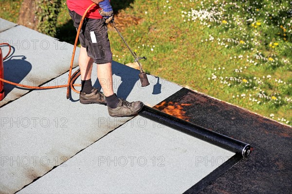 Professional flat roof waterproofing with bitumen welding membranes