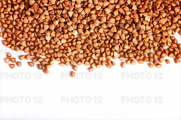 Texture of buckwheat isolated on white background. Top view