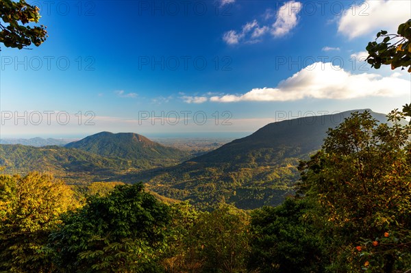 View over the mountains to the sea, Pluma Hidalgo, Pochutla, Oxaca state, Sierra Madre del Sur, Mexico, Central America