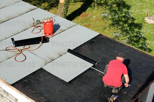 Professional flat roof waterproofing with bitumen welding membranes