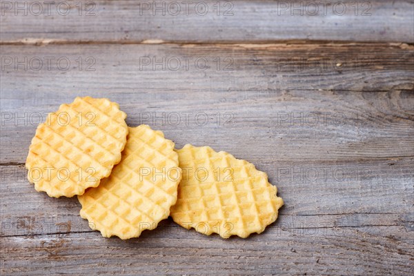 Sweet waffle on a rustic wooden background with copy space