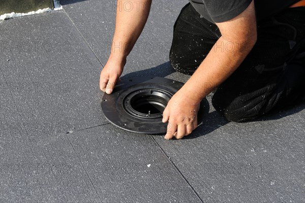 Laying sloped insulation on a flat roof (Neuhofen, Rhineland-Palatinate)