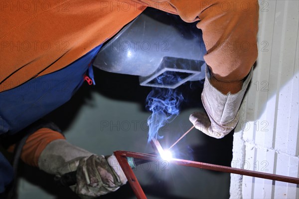 Metal worker during welding work