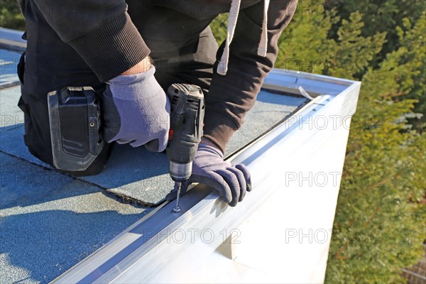 Tinsmith work on a flat roof