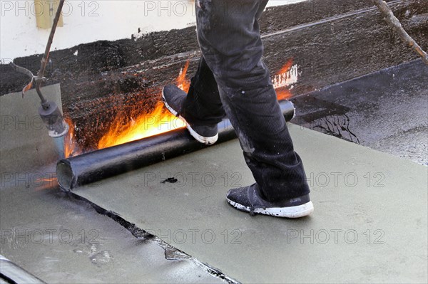 Professional flat roof waterproofing with bitumen welding membranes