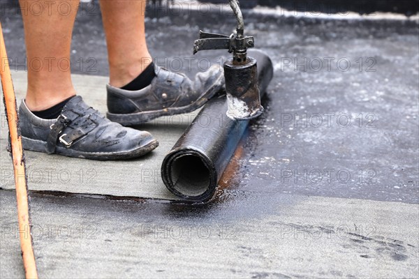 Professional flat roof waterproofing with bitumen welding membranes