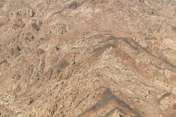 Natural texture of red rocks. Egypt, the Sinai Peninsula, Dahab