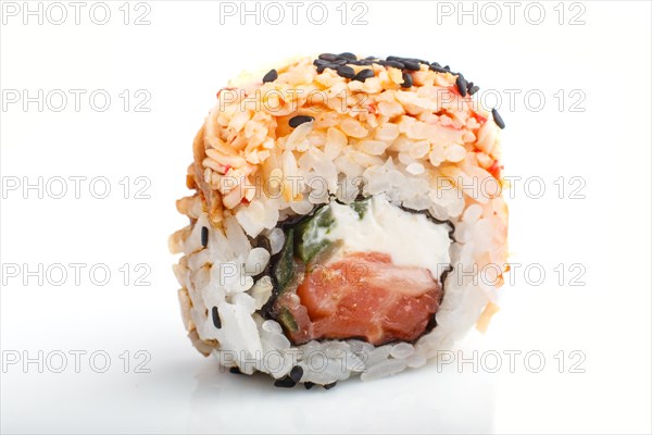 Japanese maki sushi rolls with salmon, sesame, isolated on white background. Side view, close up, selective focus