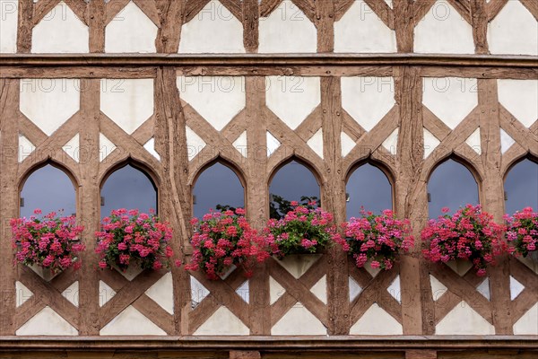 Half-timbered facade with floral decoration, Guingamp, Brittany, France, Europe