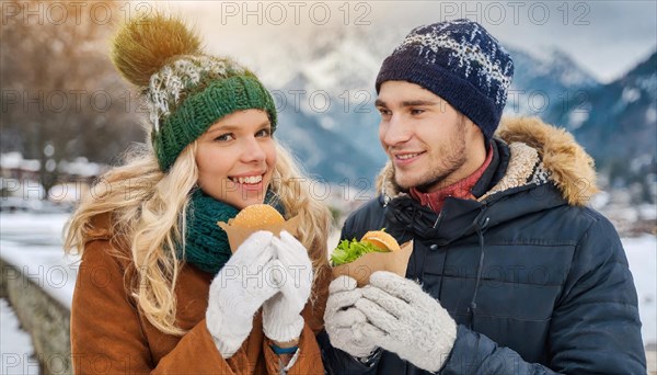 AI generated, human, humans, person, persons, man, woman, woman, 25, 30, years, two, outdoor, ice, snow, winter, seasons, eats, eat, drinks, drinking, cap, bobble hat, gloves, winter jacket, cold, cold, burger, hamburger, coffee to go, coffee, coffee mug