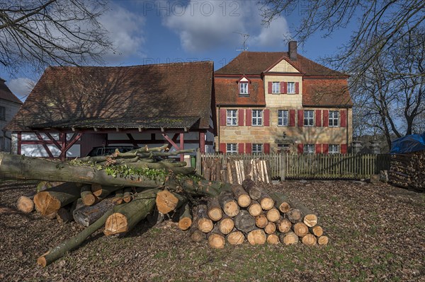 Historic vicarage from 1734 of St Egidien Church, in front the trunk of a beech (Fagus), Beerbach, Middle Franconia, Bavaria, Germany, Europe