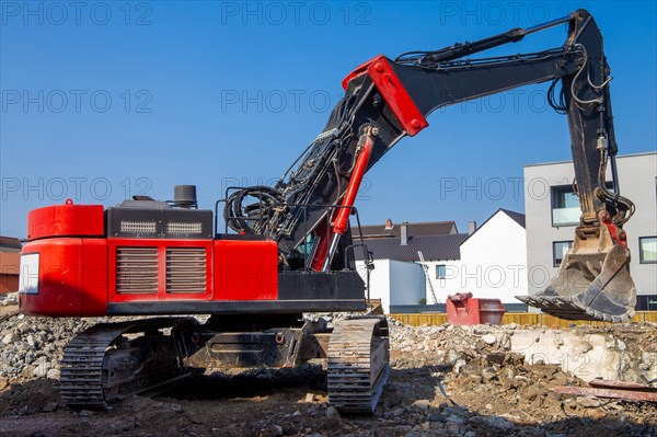Demolition excavator in action