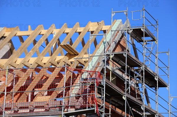 Carpentry work on a residential building under construction