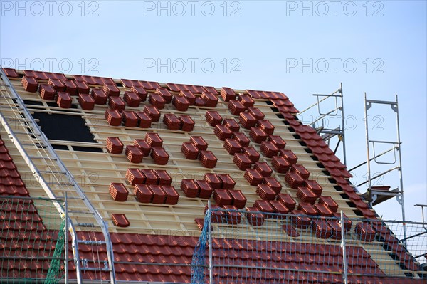 Roofing work, re-roofing of a tiled roof