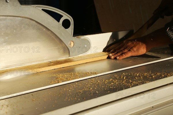 Carpenter at work in his carpentry workshop