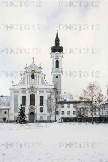 Snow-covered baroque church in winter, Marienmuenster, Diessen, Ammersee, Fuenfseenland, Pfaffenwinkel, Upper Bavaria, Bavaria, Germany, Europe