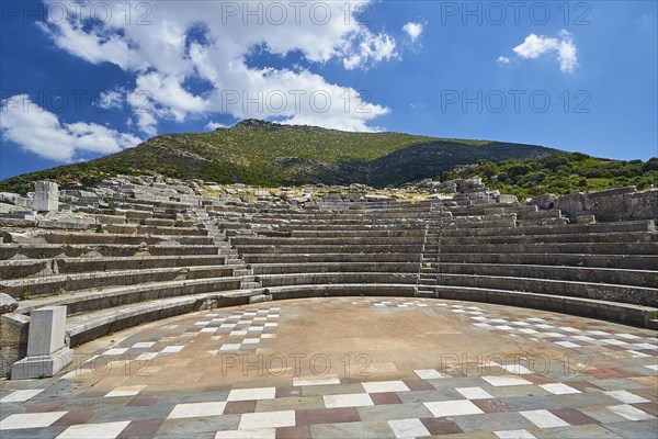 Sunny view of the ancient theatre with a view of the stage and the rows of seats, Asklepios sanctuary, Ekklesiasterion, meeting place of the citizens, archaeological site, Ancient Messene, capital of Messinia, Messini, Peloponnese, Greece, Europe