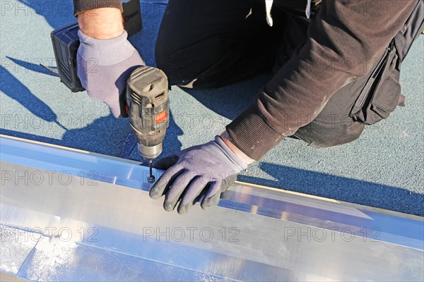 Tinsmith work on a flat roof