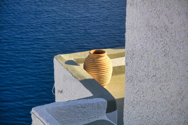 View from terrace in the evening light, Oia, Santorini, Cyclades, Greece, Europe