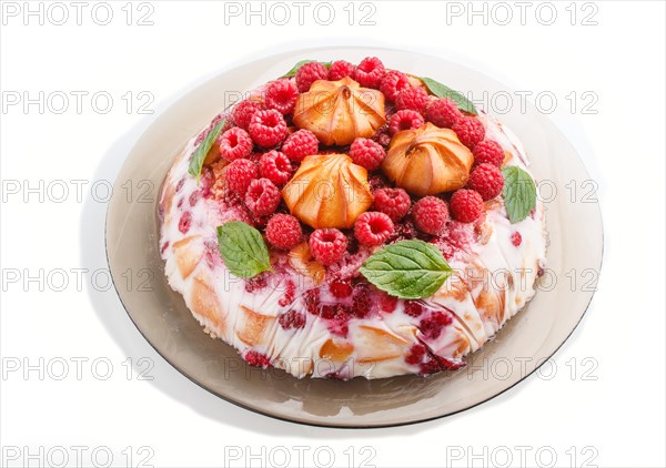 Homemade jelly cake with milk, cookies and raspberry isolated on white background. side view. close up