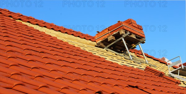 Panoramic image of the roof covering of a new tiled roof on a residential building