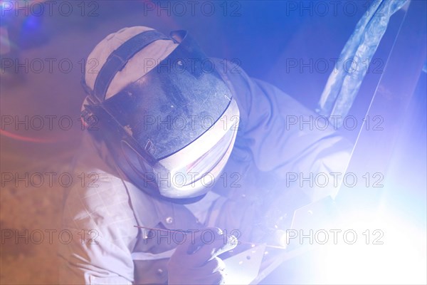 Metal worker during welding work