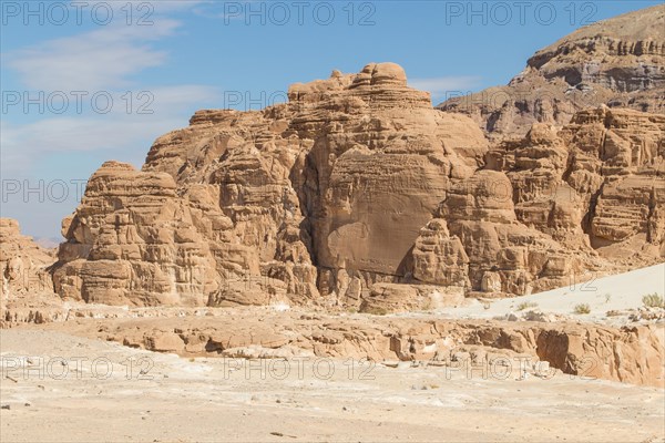 Desert, red mountains, rocks and blue sky. Egypt, the Sinai Peninsula, Dahab