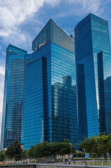 Blue glass skyscaper in the center of Singapore