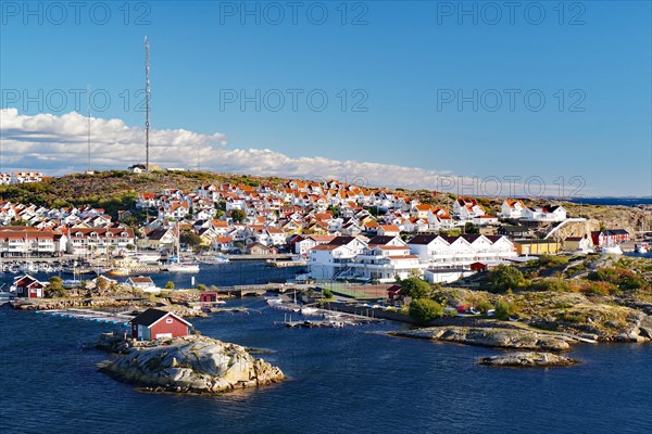 View over rocks and a small town with white houses, Vaestra Goetalands Laen, Sweden, Europe