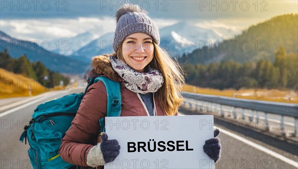 AI generated, human, humans, person, persons, woman, woman, one person, 20, 25, years, outdoor, seasons, cap, bobble hat, gloves, winter jacket, cold, cold, backpack, woman wants to travel, hitchhiking, hitchhiking, hitchhiking, road, motorway, sign saying Brussels