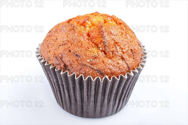 One carrot muffin isolated on white background. closeup