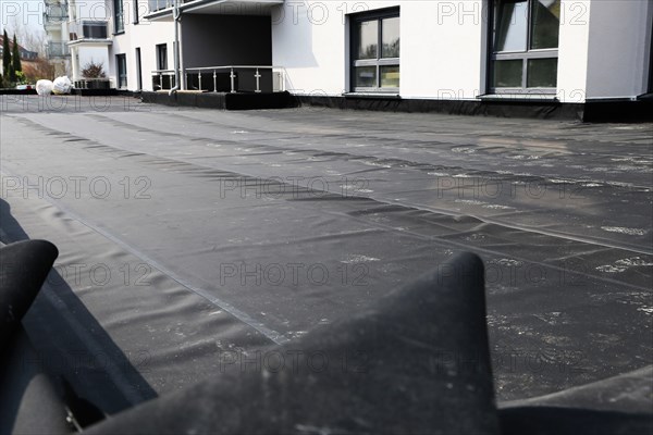 Professional flat roof waterproofing with bitumen welding membranes