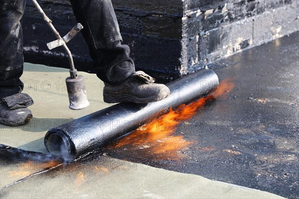 Professional flat roof waterproofing with bitumen welding membranes