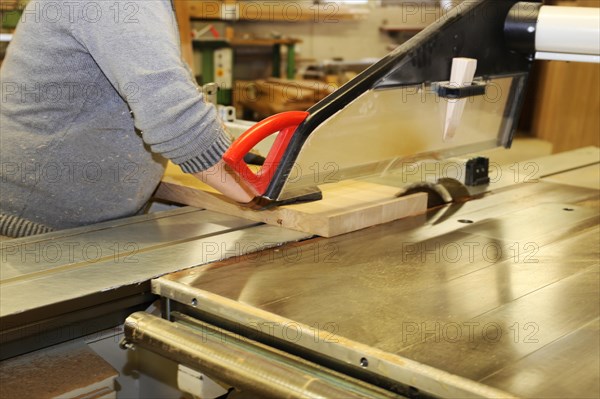 Carpenter at work in his carpentry workshop