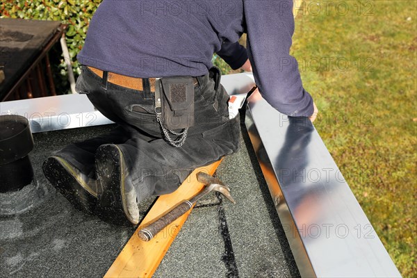 Tinsmith work on a flat roof